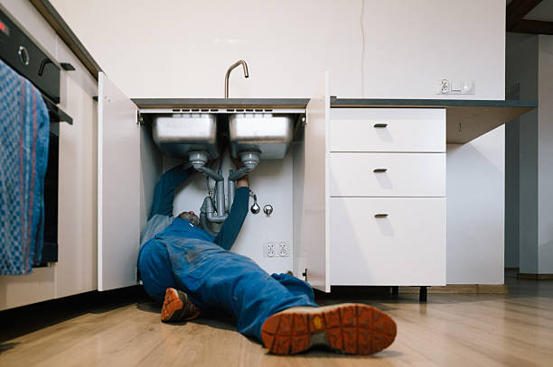 Professional Emergency Plumber technician working in Linn Grove, IA